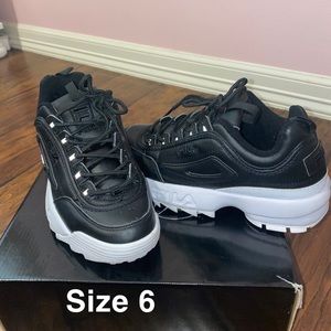 Black Fila girl tennis